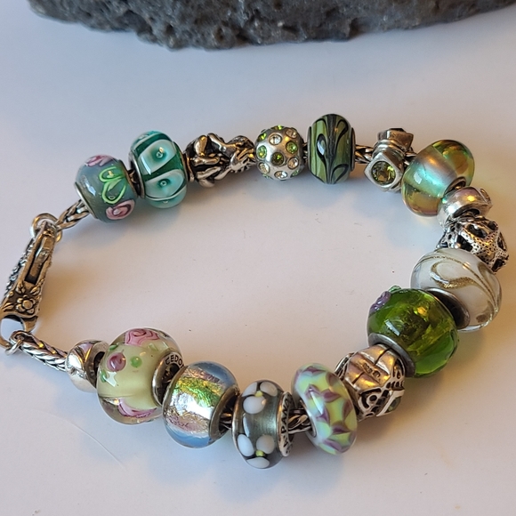 sterling silver charm bracelet full of charms marked 925 - Picture 4 of 4